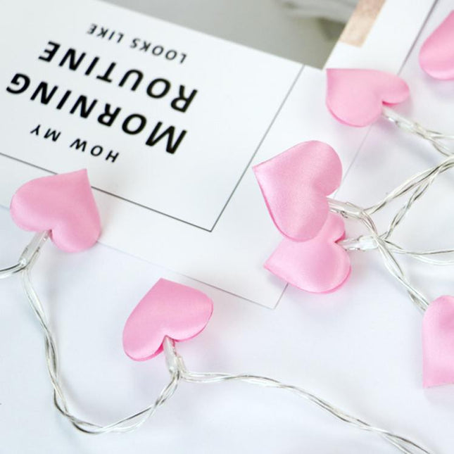 Guirnalda de luces corazones rosa infantil