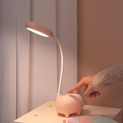 Lámpara de escritorio cerdito rosa flexible
