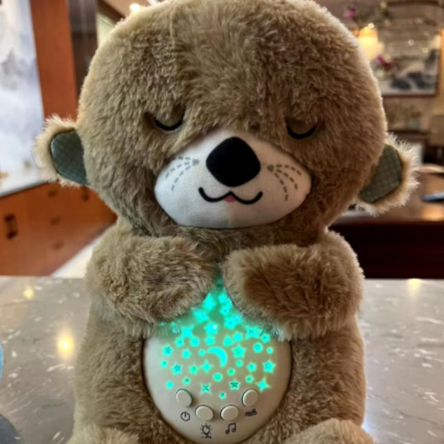 Peluche nutria que duerme con luz