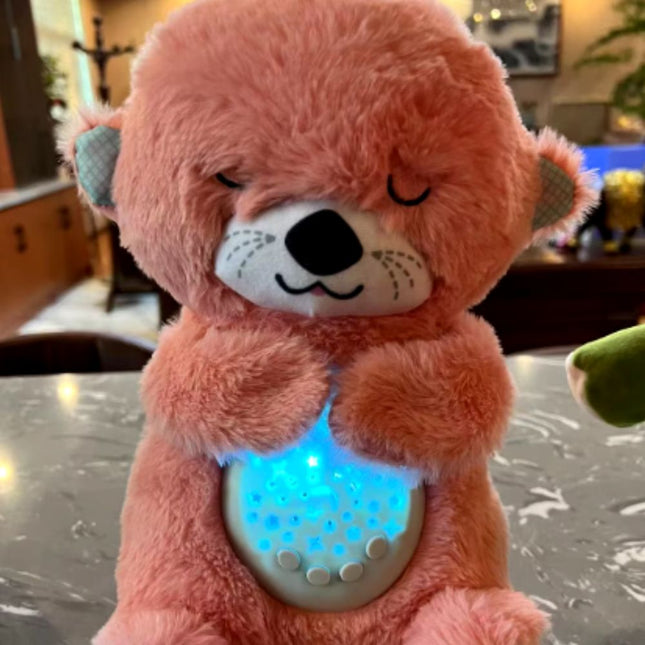 Peluche nutria que duerme con luz
