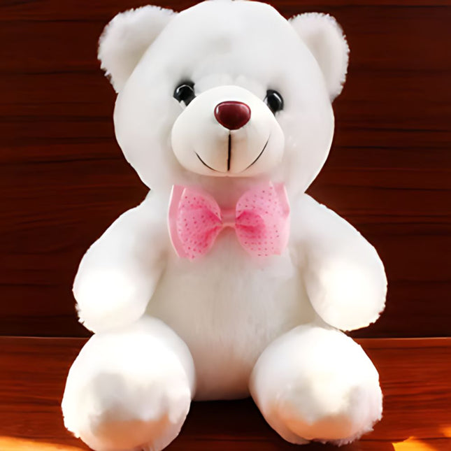 Oso de peluche con luz rosa