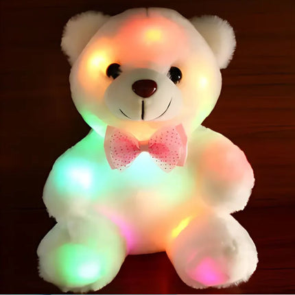 Oso de peluche con luz rosa