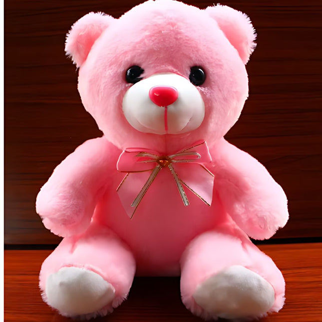 Oso de peluche con luz rosa