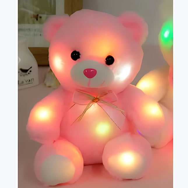Oso de peluche con luz rosa