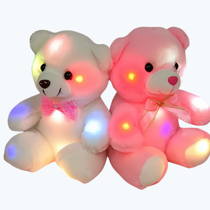 Oso de peluche con luz rosa
