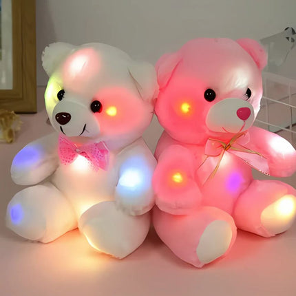 Oso de peluche con luz rosa