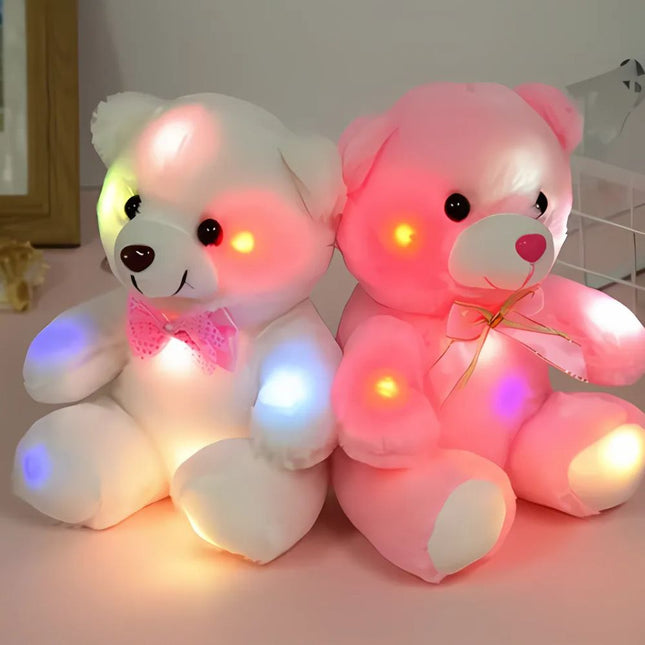 Oso de peluche con luz rosa