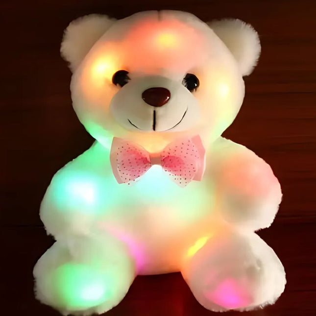 Oso de peluche con luz rosa