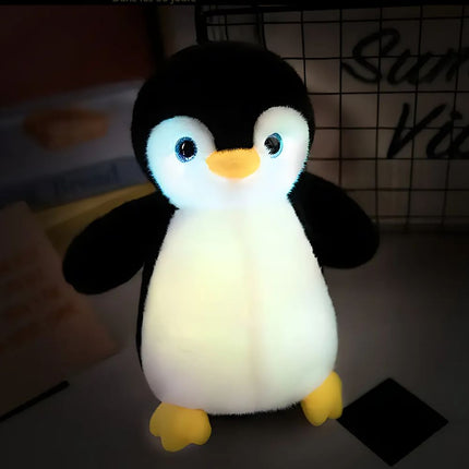 Peluche de pingüino con luz nocturna