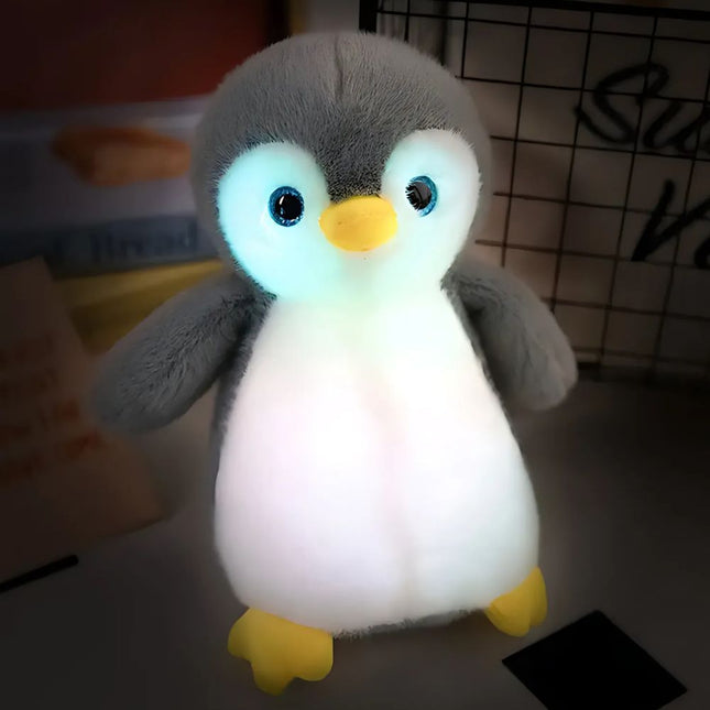 Peluche de pingüino con luz nocturna