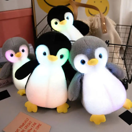 Peluche de pingüino con luz nocturna