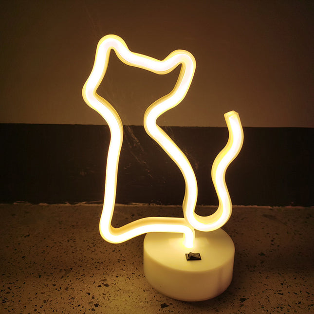 Luz de neón con forma de gato amarillo