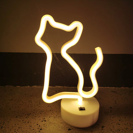 Luz de neón con forma de gato amarillo