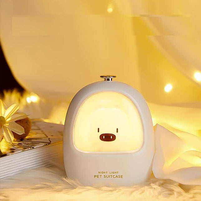 Luz quitamiedos LED táctil cerdito