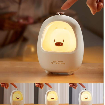 Luz quitamiedos LED táctil cerdito