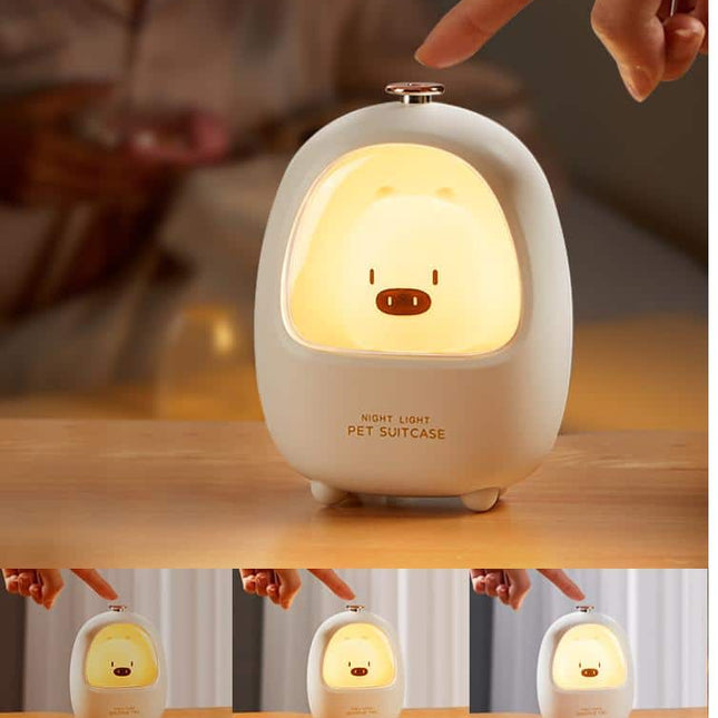 Luz quitamiedos LED táctil cerdito