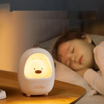 Luz quitamiedos LED táctil cerdito