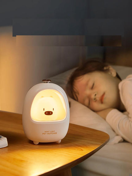 Luz quitamiedos LED táctil cerdito