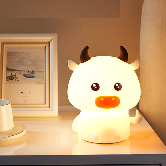 Luz nocturna LED táctil vaca