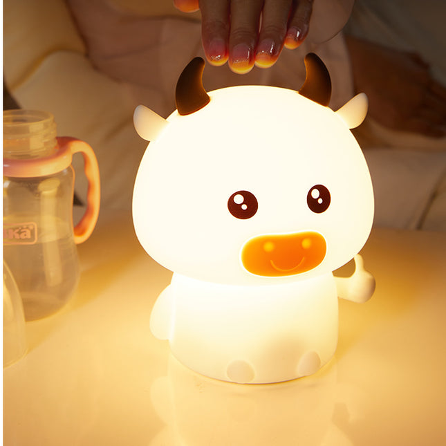 Luz nocturna LED táctil vaca