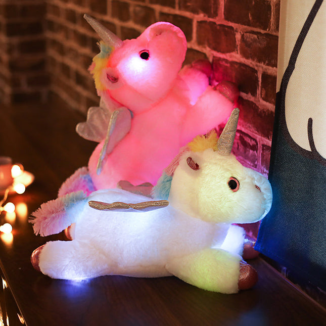 Peluche unicornio alado con luz nocturna