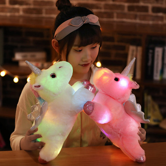 Peluche unicornio alado con luz nocturna