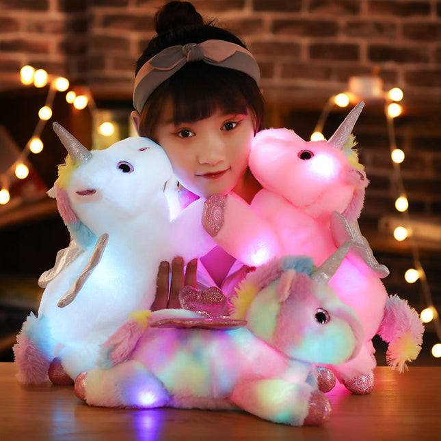 Peluche unicornio alado con luz nocturna
