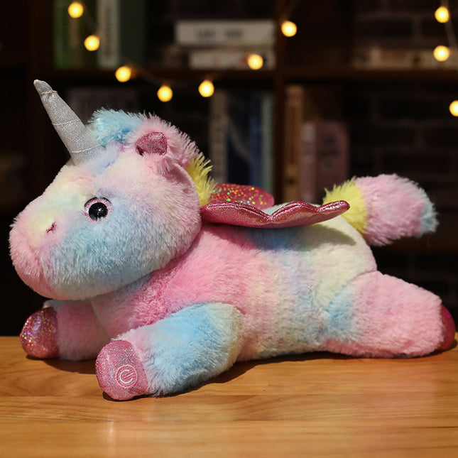 Peluche unicornio alado con luz nocturna