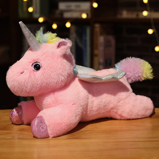 Peluche unicornio alado con luz nocturna
