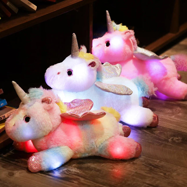 Peluche unicornio alado con luz nocturna
