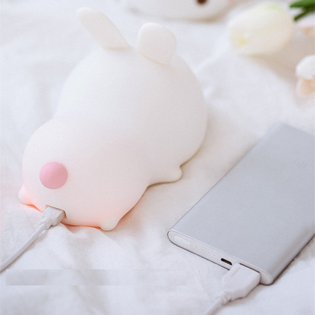 Luz quitamiedos conejo táctil con mando