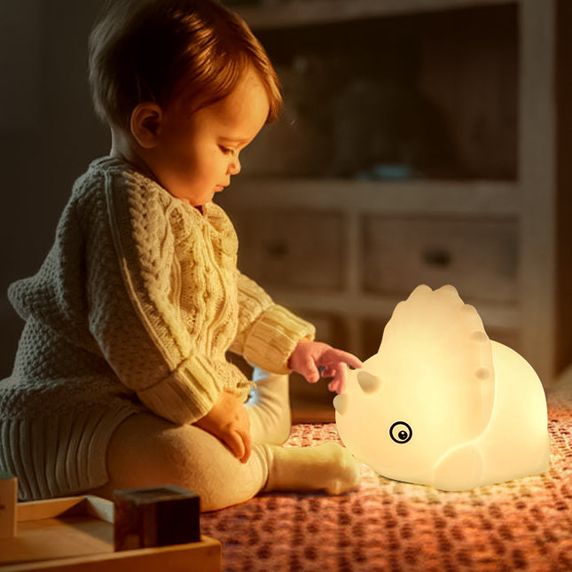 Luz quitamiedos dinosaurio de silicona táctil