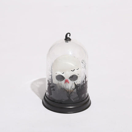 Lámpara calavera en cúpula de cristal