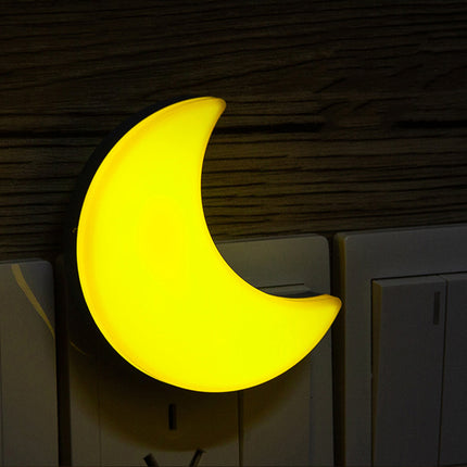 Luz de enchufe forma luna amarilla