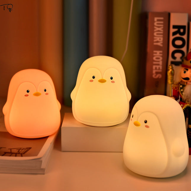 Luz quitamiedos pingüino silicona recargable