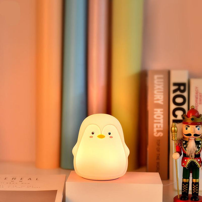 Luz quitamiedos pingüino silicona recargable