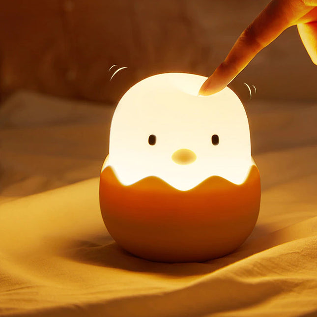 Luz quitamiedos pollito de silicona táctil