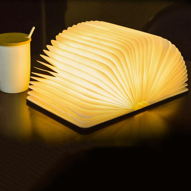 Lámpara LED plegable en forma libro