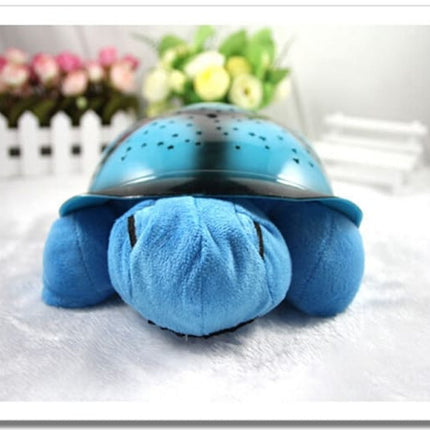 Peluche tortuga proyector de estrellas musical